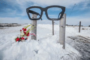 Memorial Crash Site trail head marker in winter