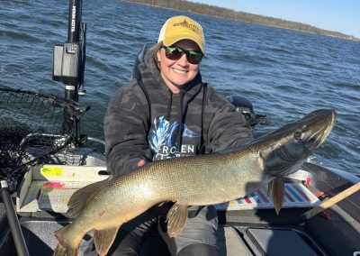 Nicole Templeton holding a 38-inch silver pike during the Stan Harrison Memorial Spring Tune-Up tournament on Clear Lake, Iowa