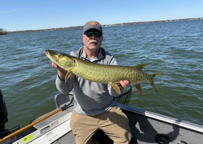 Pete Nettleton holding a 34-inch muskie during the Stan Harrison Memorial Spring Tune-Up tournament on Clear Lake, Iowa